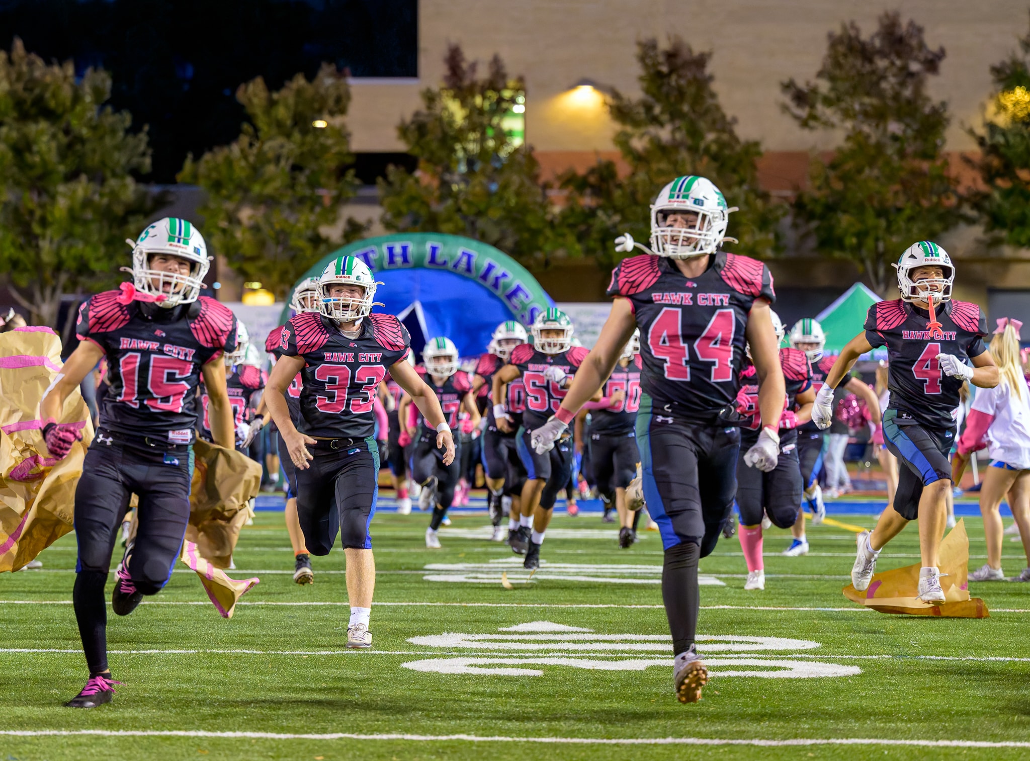 South Lakes Seahawks team runs onto field