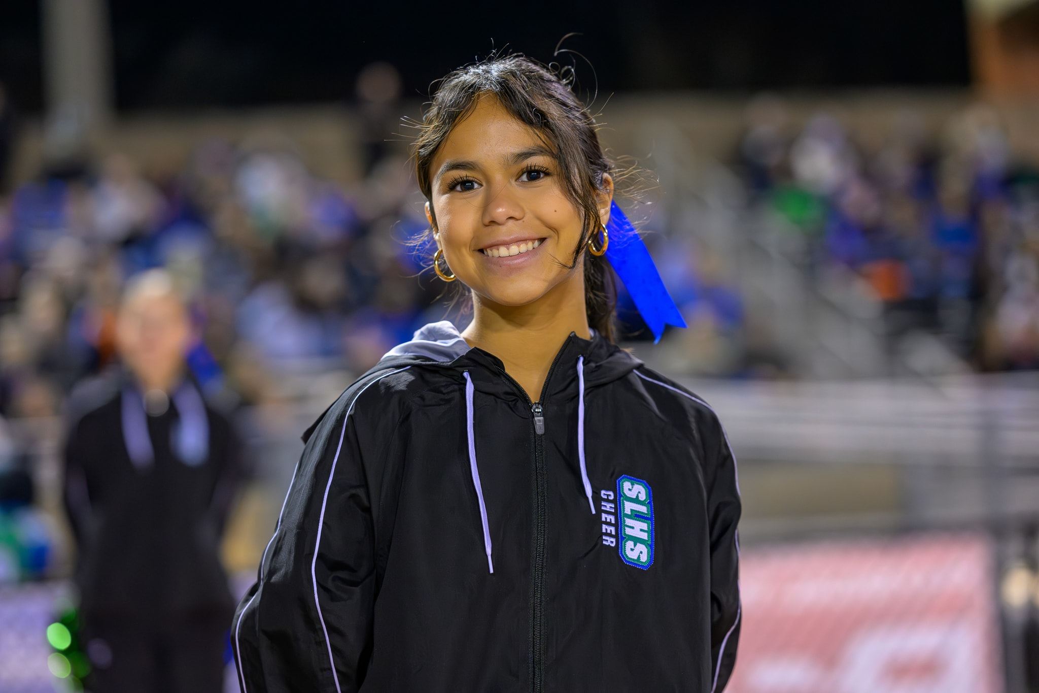 SLHS cheerleader portrait at night game